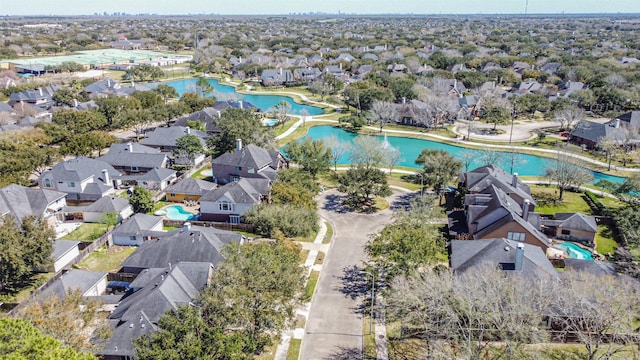 birds eye view of property with a residential view