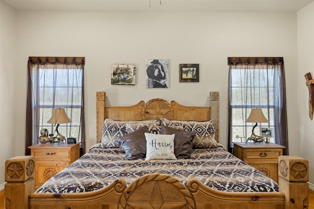 bedroom featuring multiple windows