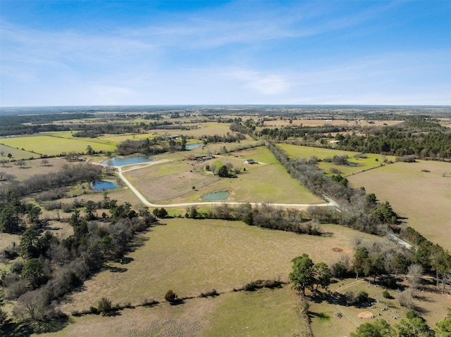 bird's eye view featuring a water view and a rural view