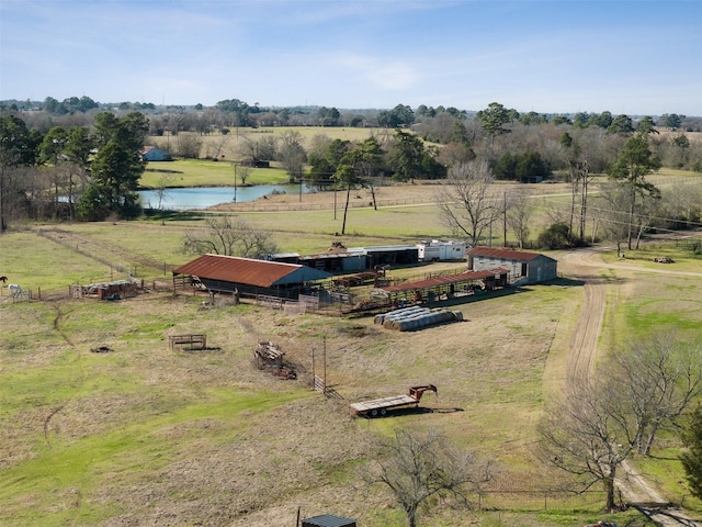 drone / aerial view with a rural view and a water view