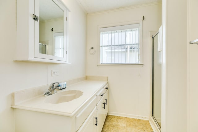 full bath with a stall shower, crown molding, and vanity