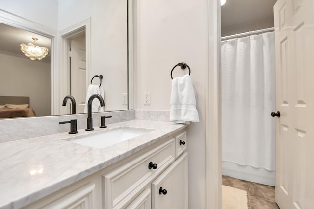 full bath with a shower with curtain and vanity