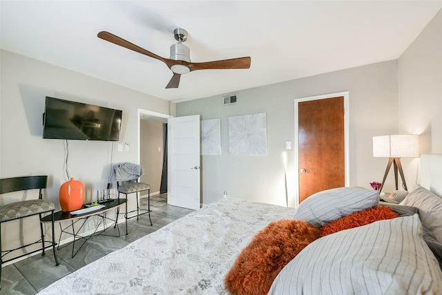 bedroom featuring visible vents and ceiling fan