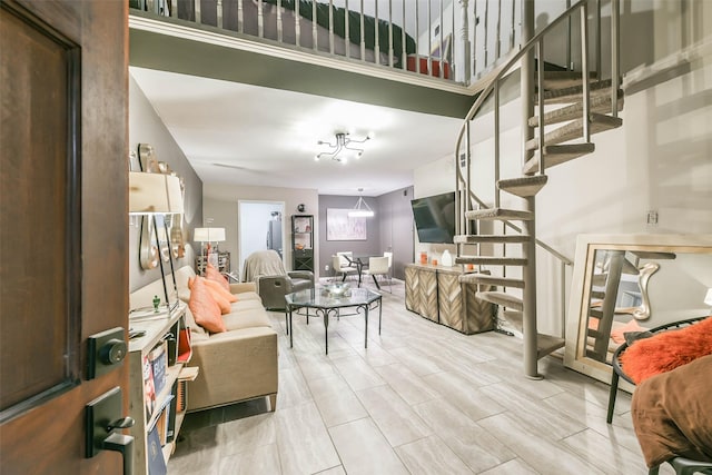 living room featuring stairs