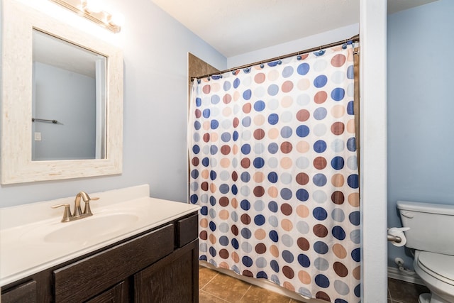 full bath featuring vanity, tile patterned floors, toilet, and a shower with curtain