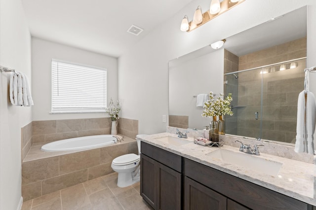 full bathroom featuring a garden tub, a sink, visible vents, and a shower stall