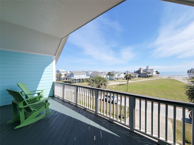 wooden deck featuring a residential view