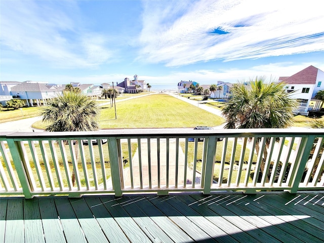 wooden deck featuring a residential view