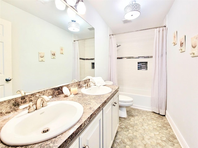 full bathroom with double vanity, a sink, shower / tub combo with curtain, and visible vents