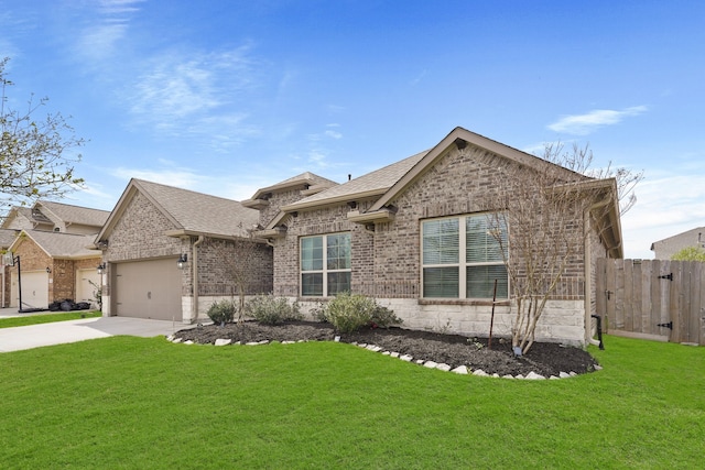 single story home featuring a front yard, brick siding, driveway, and an attached garage