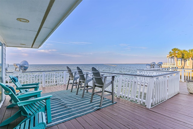 deck featuring a water view