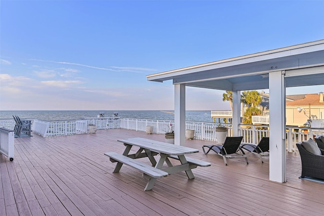 deck featuring a water view