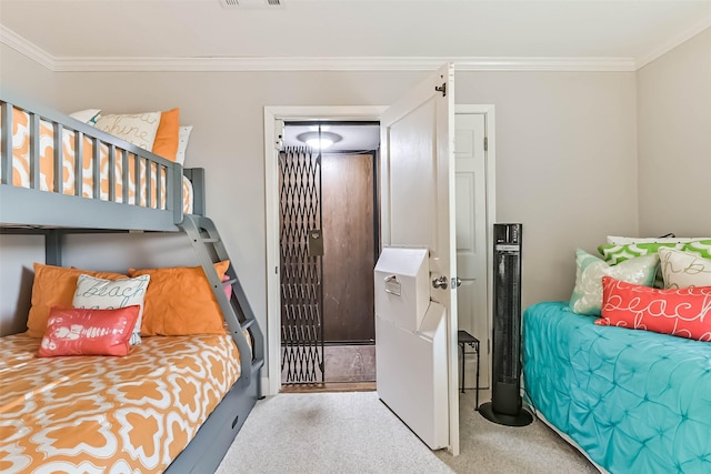 bedroom with visible vents, ornamental molding, and carpet flooring