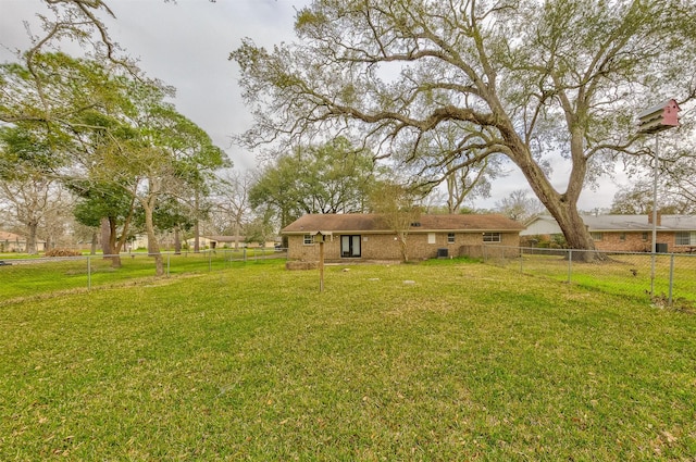 view of yard featuring a fenced backyard