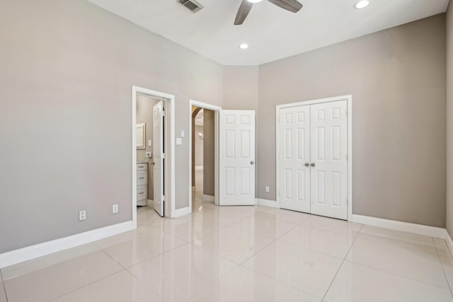 unfurnished bedroom featuring a closet, visible vents, recessed lighting, and baseboards