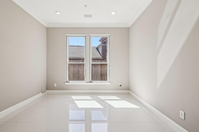 empty room with visible vents, recessed lighting, light tile patterned flooring, crown molding, and baseboards