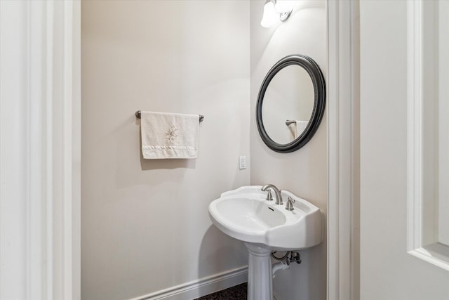 bathroom featuring baseboards