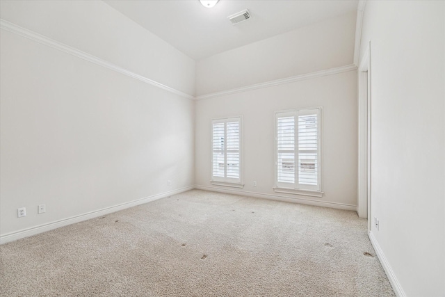 carpeted empty room with baseboards and visible vents