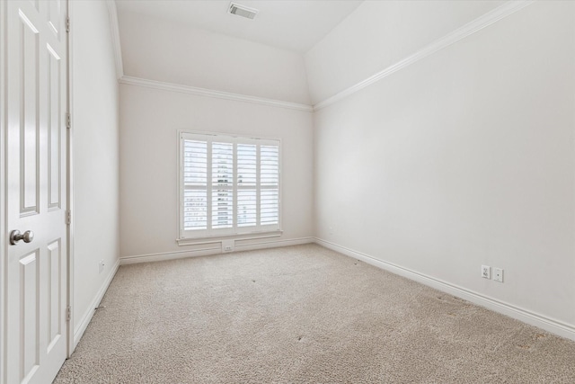 spare room with baseboards, crown molding, visible vents, and light colored carpet