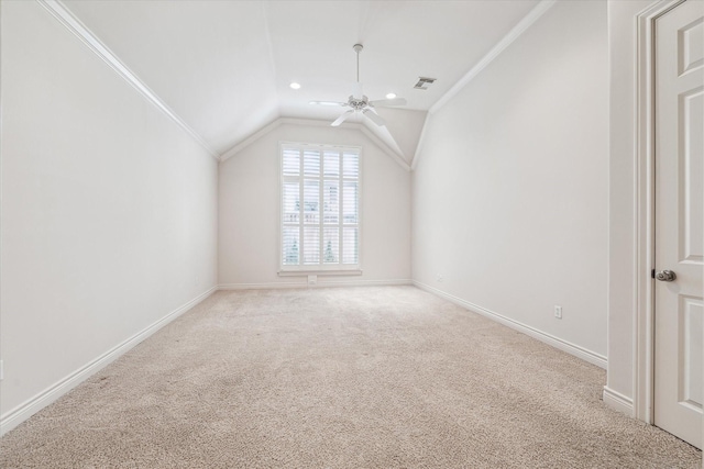 bonus room featuring visible vents, light carpet, vaulted ceiling, ceiling fan, and baseboards