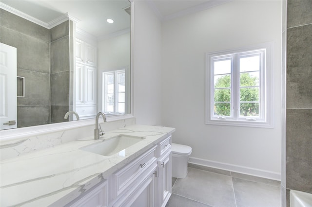 bathroom with ornamental molding, a wealth of natural light, tile patterned flooring, and baseboards