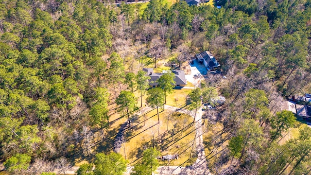 bird's eye view featuring a forest view