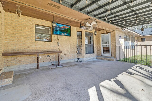 view of patio / terrace with fence