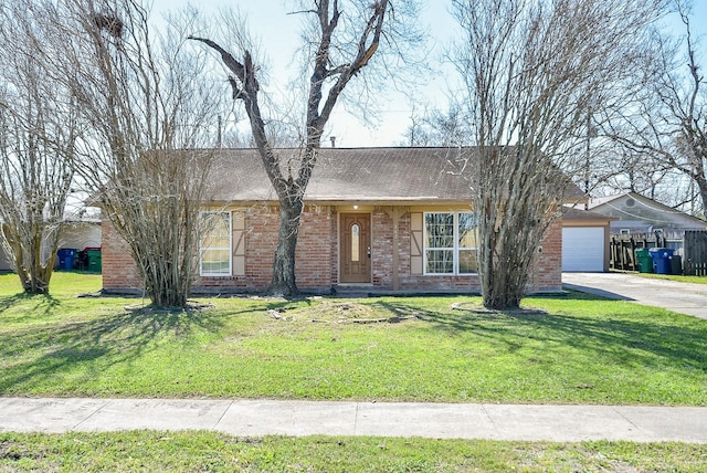 ranch-style home with a garage, a front lawn, and brick siding