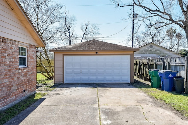 detached garage with fence