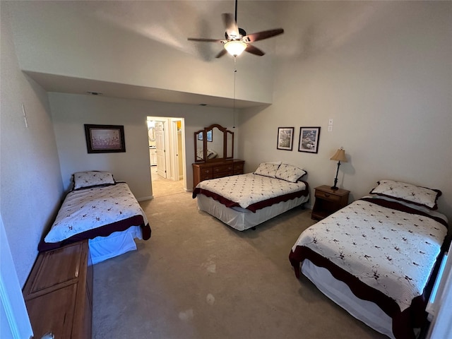 bedroom featuring carpet floors, visible vents, and a ceiling fan