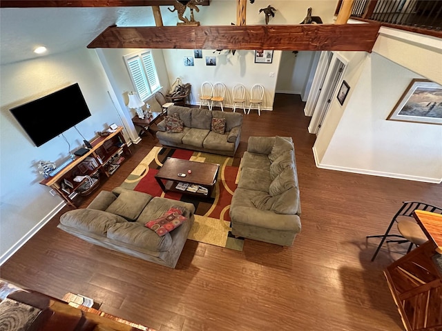 living room featuring wood finished floors and baseboards