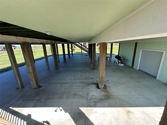 view of patio / terrace featuring stairs