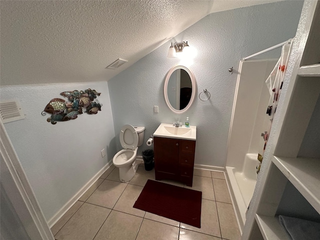 bathroom featuring vanity, visible vents, a textured ceiling, and tile patterned floors