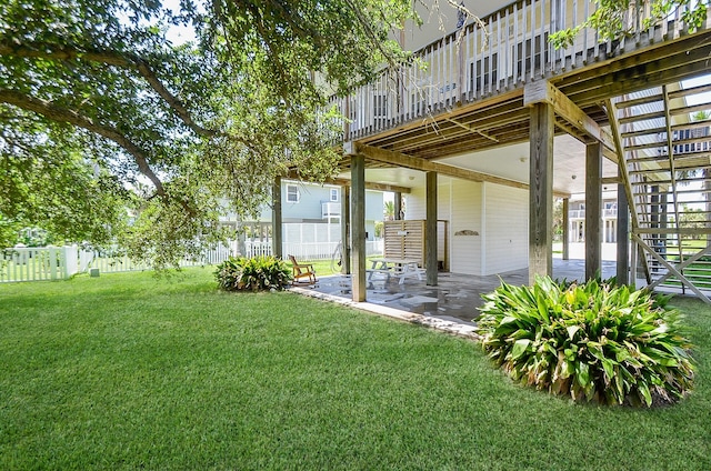 view of yard with a patio and fence