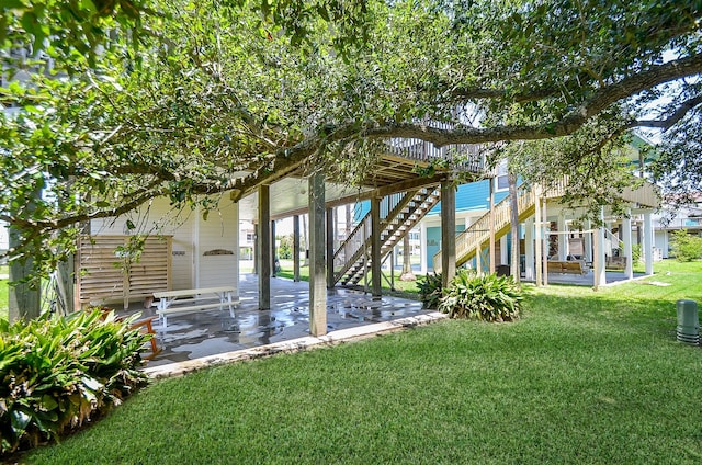 exterior space featuring stairs and a patio