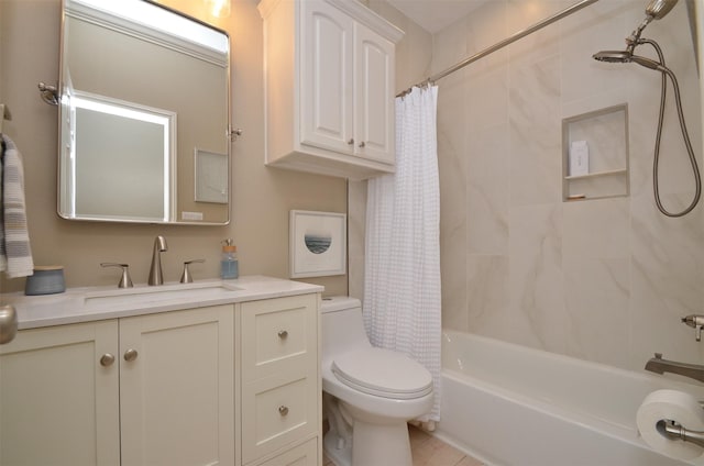 bathroom with toilet, shower / tub combo, and vanity