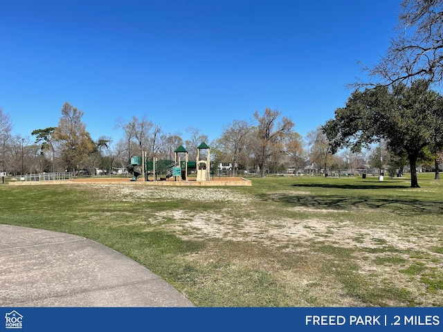 communal playground with a lawn