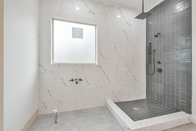 full bathroom featuring tiled shower