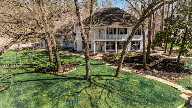 view of front of property with a front lawn and a patio area