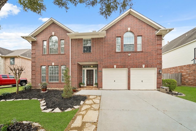 view of front facade featuring a garage, brick siding, driveway, and fence