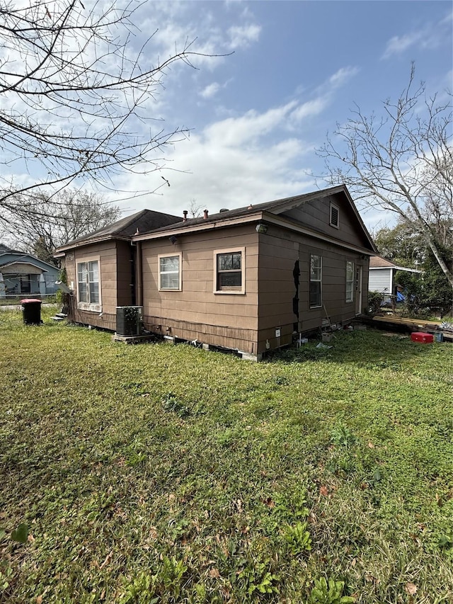 exterior space with a yard