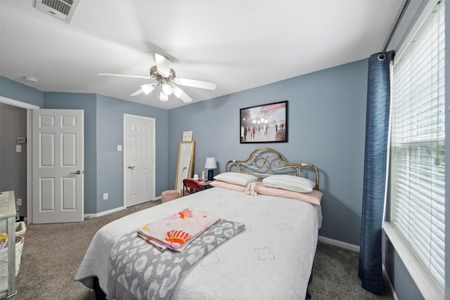 bedroom featuring carpet, visible vents, ceiling fan, and baseboards