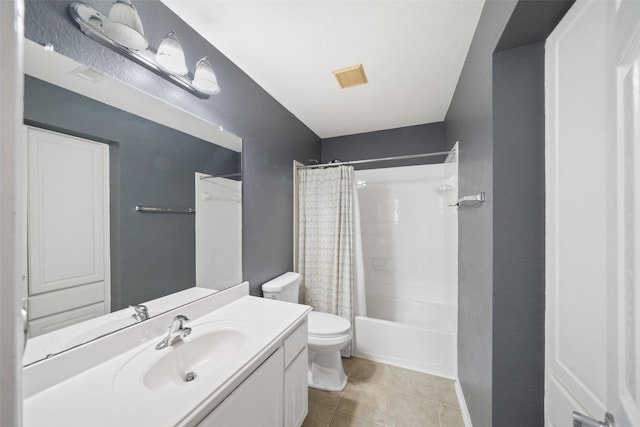 bathroom with shower / tub combo, visible vents, toilet, tile patterned floors, and vanity