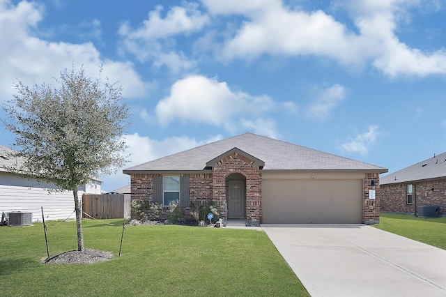 ranch-style house featuring central AC unit, concrete driveway, an attached garage, a front lawn, and brick siding