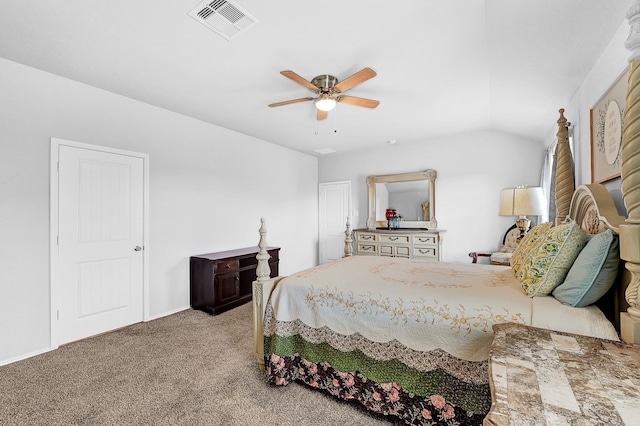 carpeted bedroom featuring lofted ceiling, visible vents, and ceiling fan