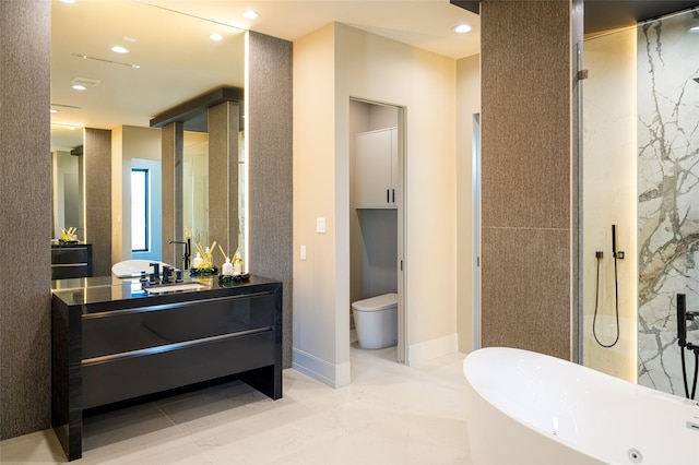 full bath with recessed lighting, a freestanding bath, vanity, and toilet