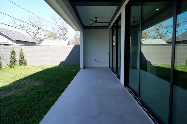 balcony featuring ceiling fan