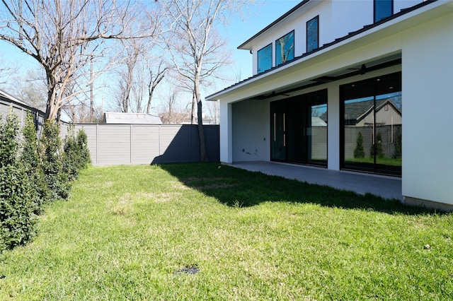 view of yard with a fenced backyard