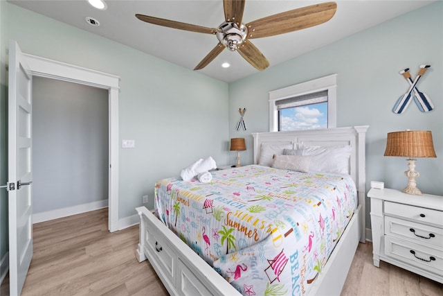 bedroom with baseboards, ceiling fan, recessed lighting, and light wood-style floors