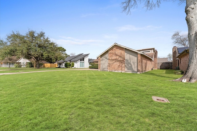 view of yard featuring fence